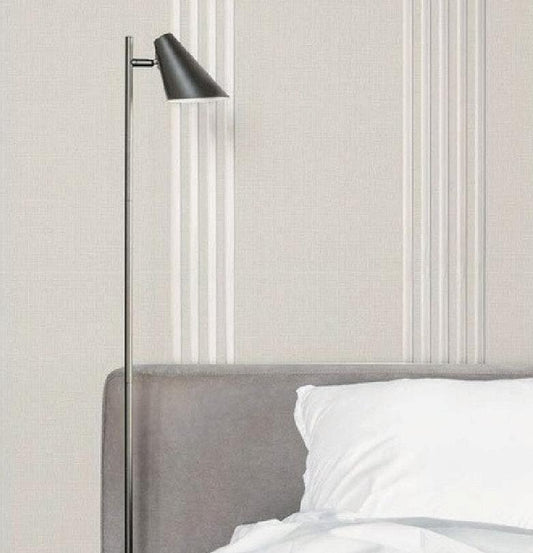 A bedroom scene showing a bed with white bedding and a gray headboard, alongside a vertical product information panel for ribbed knit wallpaper. The panel includes small fabric swatches, the text 'Ribbed Knit,' 'ACPM8BNCC,' and dimensions/roll size.